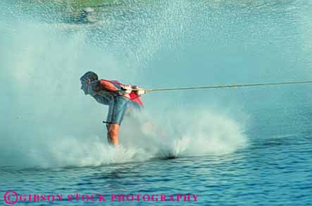 Stock Photo #5962: keywords - action aquatic backwards balance barefoot boat fall fast handle hold horz lake line man motion move movement moving outdoor outdoors outside perform performance performers pond practice pull pulled rope show showing ski skier skiers skiing skill slide speed splash strength summer swim tension tow unusual water wet
