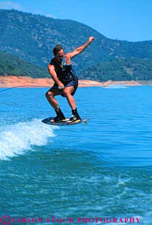 Stock Photo #5964: keywords -  action air aquatic balance board boarding boat born california fall fast fly handle hold jump lake leap line man motion move movement moving outdoor outdoors outside pond practice pull pulled released rope shasta ski skier skiers skiing skill slide speed splash strength summer swim tension tow vert wake wakeboarding water