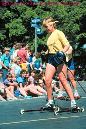 Stock Photo #5988: keywords -  balance exercise exercising glide outdoor outdoors outside pavement recreation roll roller rollerski rollerskier rollerskiing ski skier skiing sport sports street summer vert wheel wheels woman