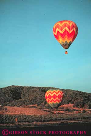 Stock Photo #5994: keywords -  air balloon ballooning california calm color colorful drift elevate elevated equilibrium float fly flyer flying glide gravity heat hot lift lifting napa overhead peaceful quiet ride rise rising solitary solitude valley vert view your