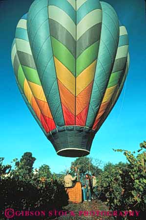 Stock Photo #5995: keywords -  air balloon ballooning california calm color colorful down drift elevate elevated equilibrium float fly flyer flying glide gravity heat hot lift lifting napa overhead peaceful quiet ride rise rising solitary solitude touch valley vert view vineyard your