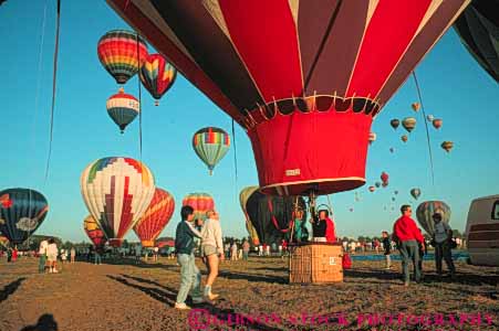 Stock Photo #6009: keywords -  aerial air array balloon ballooning balloons california calm color colorful drift elevate elevated equilibrium float fly flyer flying fresno glide gravity heat horz hot lift lifting lots many multitude off overhead peaceful quiet recreation ride rise rising round solitary solitude sport sports view vlift your