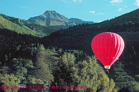 Stock Photo #6011: keywords -  aerial air balloon ballooning balloons calm co color colorado colorful drift elevate elevated equilibrium float fly flyer flying glide gravity heat horz hot lift lifting overhead peaceful quiet recreation red ride rise rising round solitary solitude sport sports telluride view your