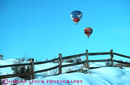 Stock Photo #6013: keywords -  aerial air aspen balloon ballooning balloons calm co color colorado colorful countryside drift elevate elevated equilibrium fence float fly flyer flying glide gravity heat horz hot landscape lift lifting overhead peaceful quiet recreation ride rise rising scenic snow solitary solitude sport sports tour view winter your