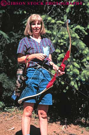 Stock Photo #6195: keywords -  aim aluminum archer archery arrow bow practice recreation shoot sport sports target vert woman