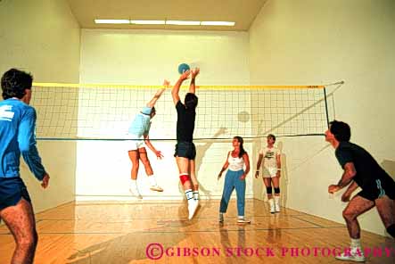 Stock Photo #6208: keywords -  action ball bounce coed coordinate coordinating coordination court female fitness hit horz indoor jump male man men motion move movement moving net play player players recreation run sport sports team teamwork volleyball walleyball woman women