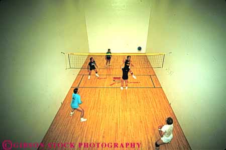 Stock Photo #6210: keywords - action ball bounce coed coordinate coordinating coordination court female fitness hit horz indoor jump male man men motion move movement moving net play player players recreation run sport sports team teamwork volleyball walleyball woman women