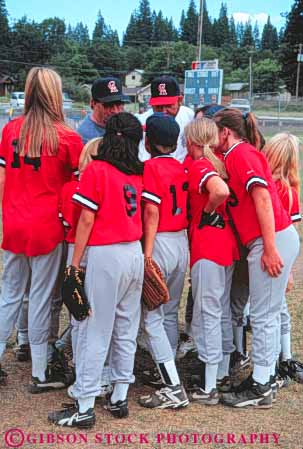 Stock Photo #6214: keywords -  adolescence adolescent adolescents ball base baseball boost booster catch catcher catching cheer child children cooperate cooperating coordinate coordination diamond female field girl girls group huddle pitch pitcher pitching play player playing practice recreation run runner running score share softball sport sports summer team throw thrower throwing together uniform vert youth