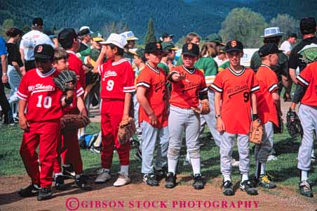 Stock Photo #6215: keywords - adolescence adolescent adolescents ball base baseball boy boys catch catcher catching child children cooperate cooperating coordinate coordination diamond ethnic field group horz male mixed pitch pitcher pitching play player playing practice recreation run runner running score sport sports summer team teams throw thrower throwing uniform youth