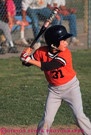 Stock Photo #6225: keywords - adolescence adolescent adolescents ball base baseball bat batter boy catch catcher catching child children cooperate cooperating coordinate coordination diamond field helmet pitch pitcher pitching play player playing practice ready recreation run runner running score sport sports summer team throw thrower throwing uniform vert youth