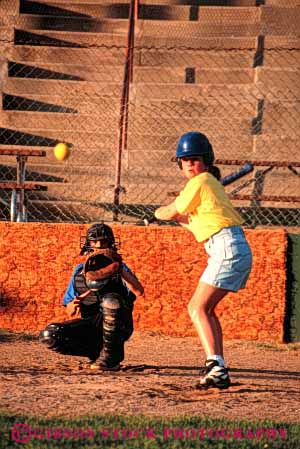 Stock Photo #6226: keywords -  adolescence adolescent adolescents ball base baseball bat batter batting catch catcher catching child children cooperate cooperating coordinate coordination diamond field girl girls pitch pitcher pitching play player playing practice recreation run runner running score sport sports summer team throw thrower throwing uniform vert youth