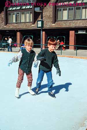 Stock Photo #6234: keywords -  balance boy boys caution children city cold exercise fit fitness fun girl girls glide ice learn pair park physical physically play practice recreation released rink skate skater skates skating slide sport sports two ut utah vert winter youth