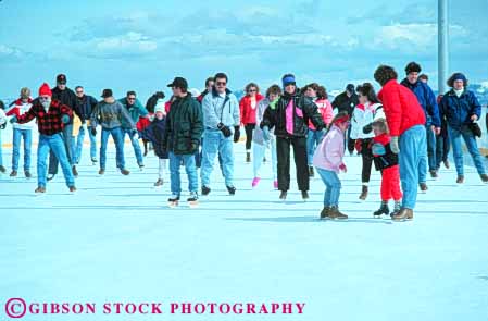 Stock Photo #6235: keywords -  balance cold crowd crowded exercise fit fitness fun glide group horz ice people physical physically play recreation rink skate skater skates skating slide sport sports winter