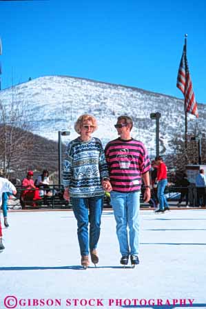 Stock Photo #6236: keywords -  affection balance city cold couple exercise fit fitness fun glide hand hands hold ice love park physical physically play recreation rink romance romantic share skate skater skates skating slide sport sports together ut utah vert winter