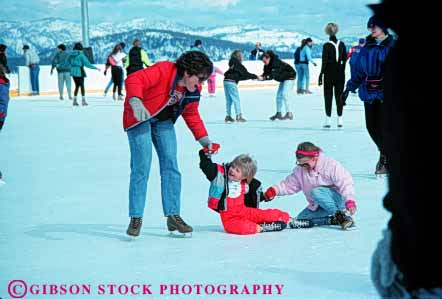 Stock Photo #6241: keywords -  assist balance cold exercise fall fit fitness fun girls glide help helps horz ice learn mother parent physical physically play practice recreation rink single skate skater skates skating slide sport sports teach winter