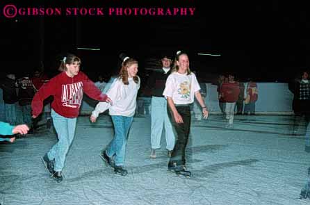 Stock Photo #6242: keywords -  balance city cold dark exercise fit fitness friend friends fun girl girls glide group high horz ice lake night physical physically play recreation rink salt school skate skater skates skating slide social sport sports student students teen teenage teenagers teens ut utah winter woman women