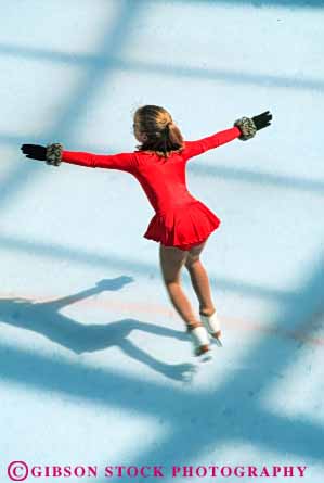 Stock Photo #6243: keywords -  arm arms balance cold colorful delicate exercise figure fit fitness form fun girl glide graceful ice physical physically play practice recreation rink routine skate skater skates skating skill slide sport sports vert winter