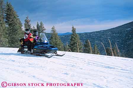 Stock Photo #6258: keywords -  activity cold drive driver driving equipment equipped fiberglass friend friends gear helmet helmets horz loud machines material mobile mobiler mobilers mobiling motor motorized noise outdoor outdoors outfit outfits outside pair passenger people person plastic recreation recreational released ride season share snow snowmobile snowmobiler snowmobilers snowmobiles snowmobiling sport sports steer suit suits synthetic team together transport transportation two vehicle winter woman women