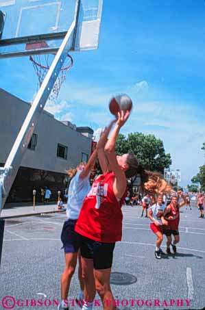 Stock Photo #6265: keywords -  action agile agility backboard ball basket basketball college compete competing competition competitor contest cooperate cooperating cooperation downtown dribble effort exercise exert exertion fit fitness fun game girl girls health high hoop lincoln motion move movement moving nb nebraska outdoor outdoors outside pass physical physically play recreation school score shoot shot skill sport sports street student summer team teen teenage teenager teenagers teens tournament vert woman women youth