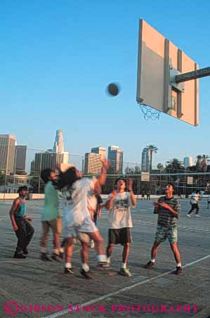 Stock Photo #6266: keywords - action agile agility angeles backboard ball basket basketball boy boys ca california city cityscape compete competing competition competitor contest cooperate cooperating cooperation downtown dribble dusk effort evening exercise exert exertion fit fitness fun game health high hoop los male man men mens motion move movement moving outdoor outdoors outside pass physical physically play recreation school score shoot shot skill skyline sport sports student summer team teen teenage teenager teenagers teens vert youth