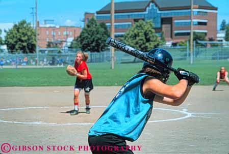 Stock Photo #6269: keywords -  action base baseball bases bat batter batting dynamic fast game girl girls home horz move movement moving pitch pitcher pitches pitching plate play player recreation run runner running runs softball sport sports summer team teen teenage teenager teenagers teens woman youth