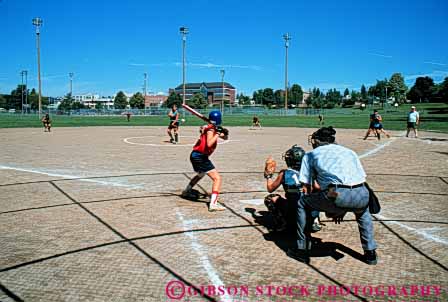Stock Photo #6270: keywords -  action base baseball bases bat batter batting dynamic fast game girl girls home horz move movement moving official pitch pitcher pitches pitching plate play player recreation run runner running runs softball sport sports summer team teen teenage teenager teenagers teens ump umpire woman youth