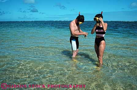 Stock Photo #6282: keywords -  active activity adventure beach breath breathing coast couple dive diver divers diving equipment equipped explore fitness fun gear hawaii hold horz ocean play recreation sea shallow share snorkel snorkeler snorkelers snorkeling sport sports swim swimmer swimmers swimming team together travel trip tropical tube vacation water