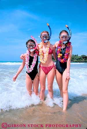 Stock Photo #11408: keywords - beach beaches children destination dive equipment friend friends fun girl girls hawaii in leis ocean play playing portrait recreation released sea snorkel splash surf three travel vacation vert water wave waves with