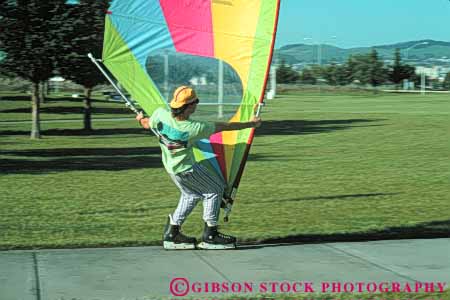 Stock Photo #6291: keywords -  balance blade coordination glide horz man park practice propel propelled push recreation roll roller rollerblade rolling sail sidewalk skate skater skating sport sports surf wind windskating windsurf windsurfer windsurfing