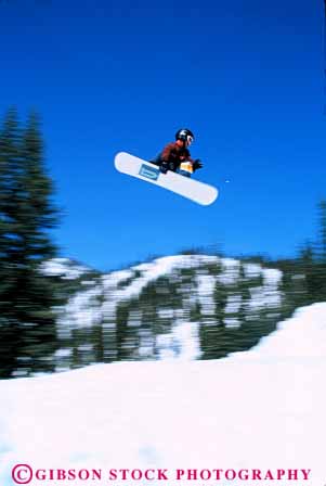 Stock Photo #6298: keywords -  airborn aloft board boarder boarding boy compete competing competition competitor contest danger downhill fall fly flying freestyle helmet injury jump leap recreation risk snow snowboard snowboarder snowboarding soar sport sports teen teenage teenager teenagers teens thrill vert winter youth