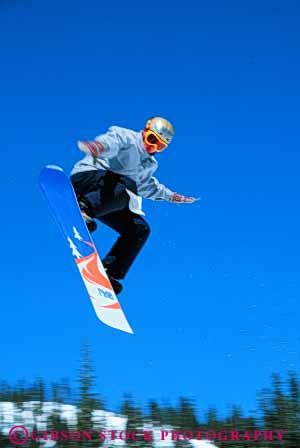 Stock Photo #6301: keywords - airborn aloft balance balanced balancing board boarder boarding boy compete competing competition competitor contest danger downhill fall fly flying freestyle helmet injury jump leap recreation risk snow snowboard snowboarder snowboarding soar sport sports teen teenage teenager teenagers teens thrill vert winter youth