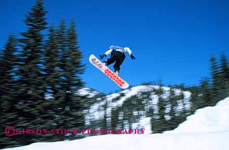 Stock Photo #6302: keywords -  airborn aloft board boarder boarding compete competing competition competitor contest danger downhill fall fly flying freestyle helmet horz injury jump leap recreation risk snow snowboard snowboarder snowboarding soar sport sports teen teenage teenager teenagers teens thrill winter youth