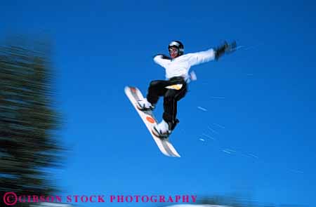 Stock Photo #6303: keywords - airborn aloft board boarder boarding compete competing competition competitor contest danger downhill fall fly flying freestyle helmet horz injury jump leap recreation risk snow snowboard snowboarder snowboarding soar sport sports teen teenage teenager teenagers teens thrill winter youth