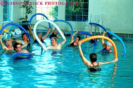 Stock Photo #6327: keywords -  aerobic aerobics athlete athletic class classes condition conditioning elderly exercise exercising exert exerting exertion fit fitness flex flexibility flexible flexing group health horz indoor limber loose loosen loosening man mature men muscle old older people person physical physically pool recreation relax relaxed relaxing senior seniors sport strength strengthen strengthening stretch stretching summer swimming tone up vitality warm warmup water woman women