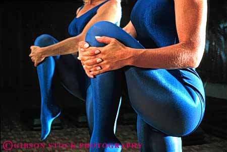 Stock Photo #6328: keywords - aerobic athlete athletic blue condition conditioning exercise exercising exert exerting exertion fit fitness flex flexibility flexible flexing glass health horz indoor knee leg limber loose loosen loosening mirror muscle physical physically recreation reflection relax relaxed relaxing released sport strength strengthen strengthening stretch stretching summer tone vitality warmup woman