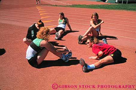 Stock Photo #6329: keywords -  aerobic and athlete athletic college condition conditioning exercise exercising exert exerting exertion field fit fitness flex flexibility flexible flexing group health horz limber loose loosen loosening muscle outdoor outdoors outside physical physically recreation relax relaxed relaxing runners sport strength strengthen strengthening stretch stretching summer tone track up vitality warm warmup woman