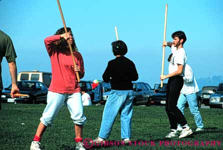 Stock Photo #6334: keywords -  akido art class combat contact defense educate education group horz learn man martial men outdoor outdoors outside practice recreation skill sport stick student summer woman women