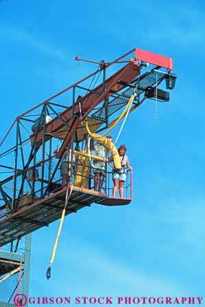 Stock Photo #6335: keywords - brave bungee consider contemplate cord danger decide down elastic event fall fear fun game gravity harness injury jump jumper jumping leap play risk safety scare scared scary stretch think thrill thriller thrilling vert woman