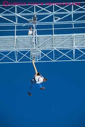 Stock Photo #6336: keywords -  african american black brace bungee cord danger down elastic ethnic event fall fear fun game gravity harness injury jump jumper jumping leap man minority play risk safety scare scared scary stretch thrill thriller thrilling vert