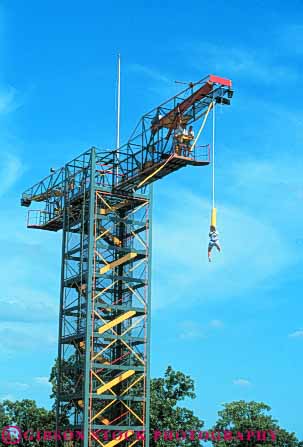 Stock Photo #6338: keywords -  bungee cord danger down elastic event fall fear fun game gravity harness injury jump jumper jumping leap play risk safety scare scared scary stretch thrill thriller thrilling vert woman