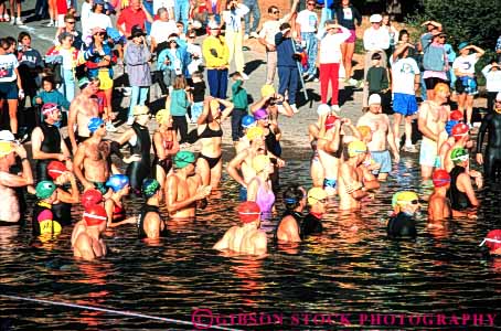 Stock Photo #6344: keywords - athlete athletes athletic california challenge challenging compete competing competition competitor condition conditioning contest crowd crowded dedicate dedicated dedication endurance fit fitness group hard horz lake mt physical physically shasta skill start strength swim swimmer swimmers swimming training triathalon water