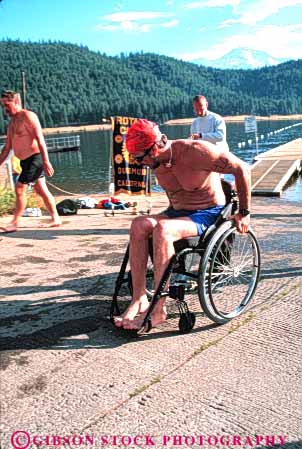 Stock Photo #6348: keywords -  athlete athletes athletic california challenge challenging compete competing competition competitor condition conditioning contest dedicate dedicated dedication disable disabled disadvantage disadvantaged endurance fit fitness handicap handicapped hard man mt physical physically shasta skill strength swim training triathalon vert wheelchair