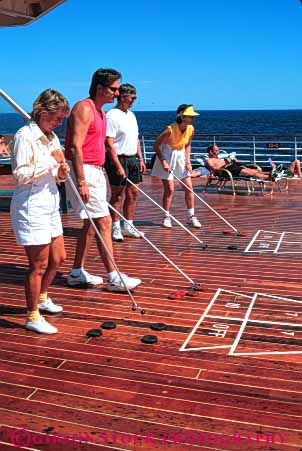 Stock Photo #6351: keywords - adult adults board contest cruise deck friction friend friends fun game gender geometric geometry group line lines men mixed pattern play practice push recreation ship shuffle shuffleboard skill slide sport summer team teams travel trip vacation vert women