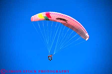 Stock Photo #6360: keywords -  air colorful crash danger dangerous dive drift flight float fly flyer flying glide gravity horz injure injury parachute paraglide paraglider paragliding recreation resistance risk risky sky sport steer suspend suspended