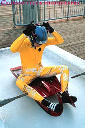 Stock Photo #6366: keywords -  aerodynamic aerodynamics alone chill chilly chute cold course danger dangerous downhill fast gravity ice icy injury luge park race racer racing risk slide slider sliding slip slippery solo speed sport sports start suit track utah vert winter yellow