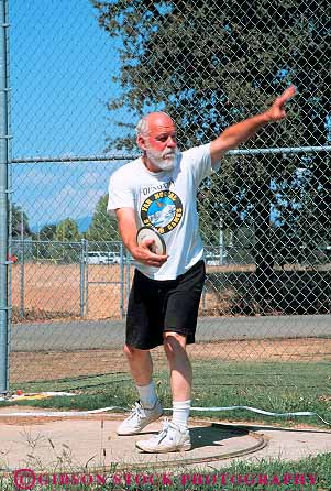 Stock Photo #13472: keywords - active activity aged aging athlete athletes athletic athletics california challenge challenging citizen citizens commitment compete competing competition competitor competitors condition conditioning contest contestants contests coordination determination discus disk effort elderly endurance exercise exercising exertion field fit fitness games longevity man mature men old olympics people performance physical physically race racer racers races racing recreation redding senior seniors sports strength throw thrower throwing throws track training vert