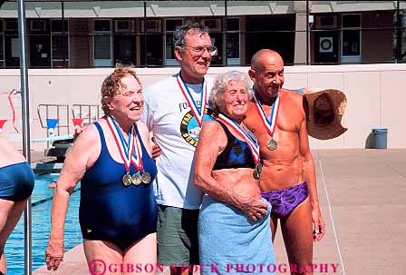 Stock Photo #13479: keywords -  achieve achieved achievement achieving active activity affection aged aging athlete athletes athletic athletics award awarding awards california challenge challenging champion champions citizen citizens commitment compete competing competition competitor competitors condition conditioning contest contestants contests coordination demanding determination effort elderly embrace embraced embracing endurance exercise exercising exertion face faces fit fitness friend friends games grin grinning grins group groups happiness happy horz hug hugging hugs longevity man mature men old olympics pair people performance physical physically proud race racer racers races racing recreation redding ribbon ribbons senior seniors smile smiles smiling sports strength strenuous swim swimmer swimmers swimming swims together training two win winner winners winning wins woman women