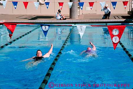 Stock Photo #13486: keywords -  active activity aged aging athlete athletes athletic athletics backstroke california challenge challenging citizen citizens commitment compete competing competition competitor competitors condition conditioning contest contestants contests coordination demanding determination effort elderly endurance exercise exercising exertion fit fitness games horz longevity mature old olympics people performance physical physically pool race racer racers races racing recreation redding senior seniors sports strength strenuous stroke swim swimmer swimmers swimming training water womens