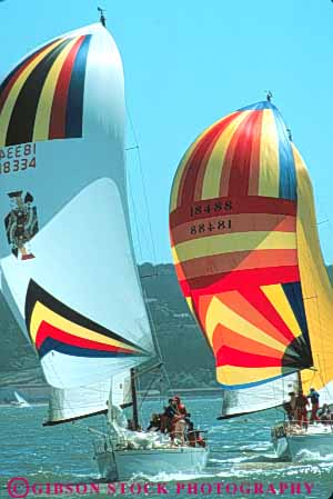 Stock Photo #10805: keywords -  air bay boat boating boats california colorful francisco power push pushing race racers races racing recreation sail sailboat sailboats sailing sails san spinnaker spinnakers sport vert wind