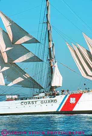 Stock Photo #10822: keywords -  barque barques bay beautiful big boat boats california coast eagle francisco guard huge insignia large mast masted masts pretty sail sailing sails san schooner schooners ship ships symbol symbols tall training triangle triangles triangular vert white